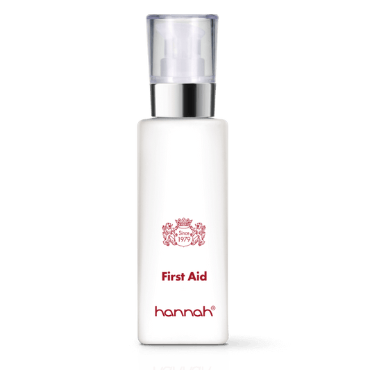 hannah First Aid 125ml grote witte fles transparante dop zilver ring rode letters 