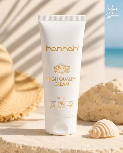 hannah High Quality Cream SPF 15 65 ml dagcrème in zomerse sfeer met schelpen en zonlicht

